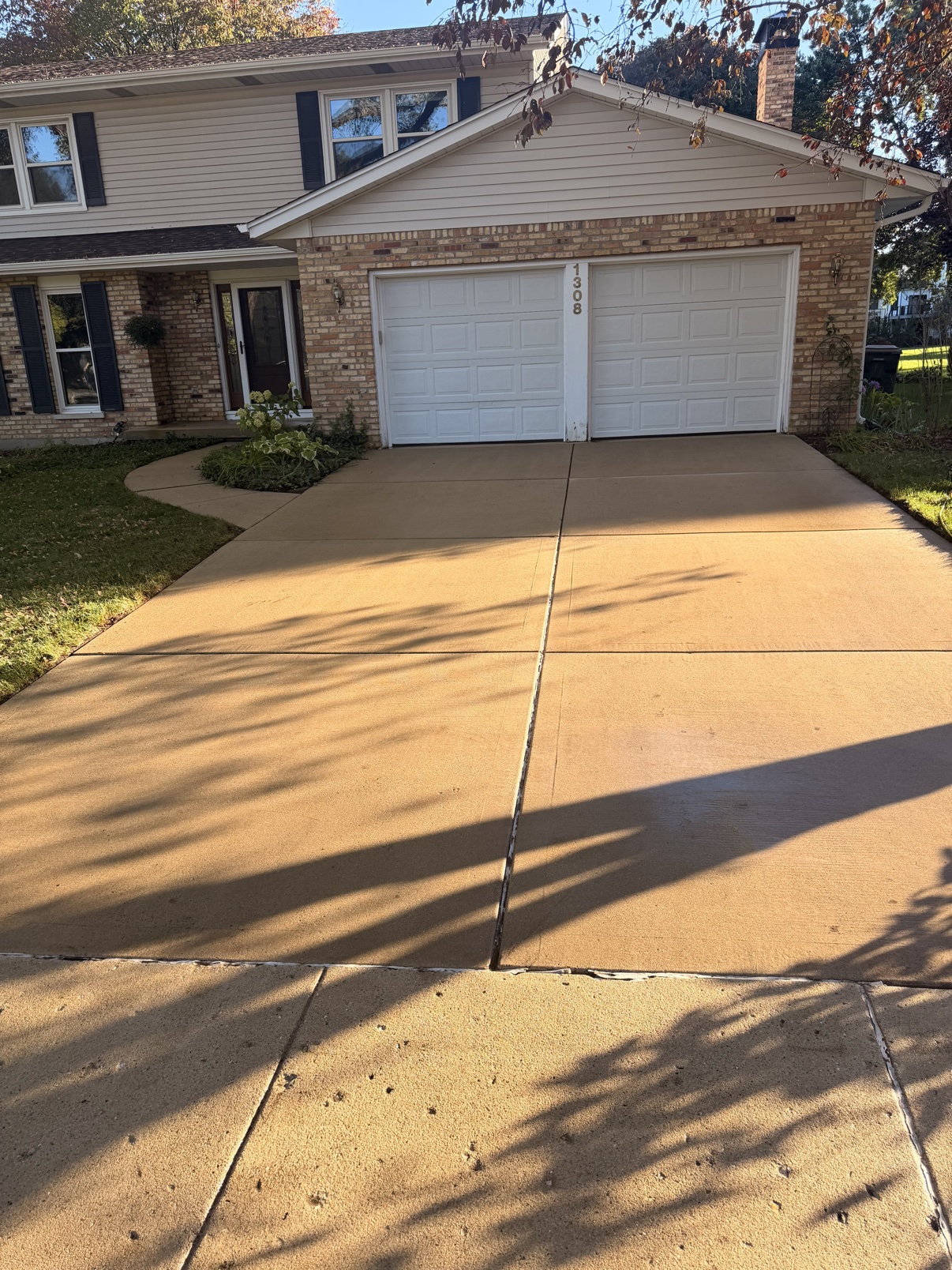 After: driveway power washed clean